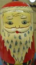 Load image into Gallery viewer, Vintage Russian doll Santa with  one tiny Santa inside
