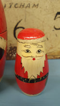 Load image into Gallery viewer, Vintage Russian doll Santa with  one tiny Santa inside
