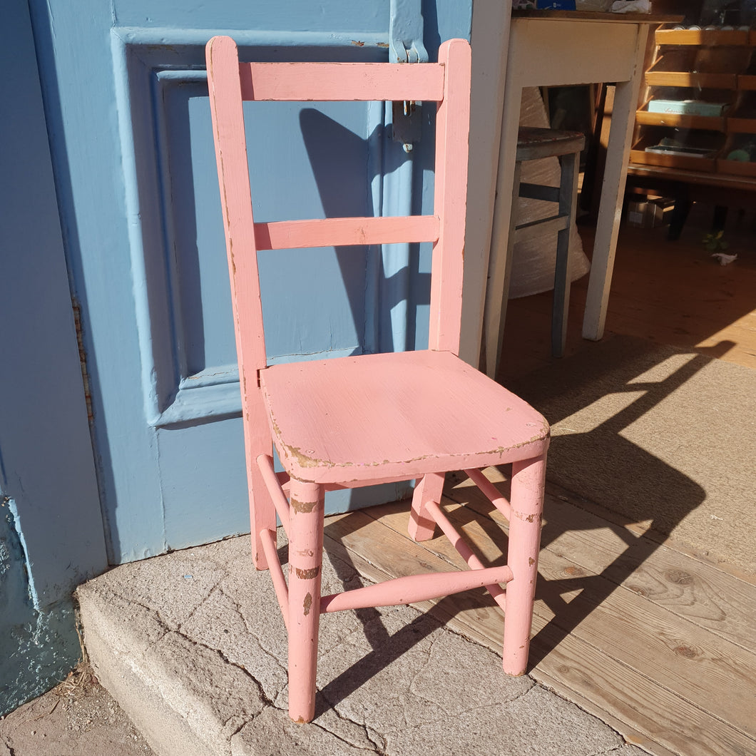 Wonderfully sweet childs pink chippy wooden chair
