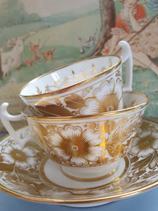 Early 19th century English antique porcelain trio of tea cup, coffee cup and saucer