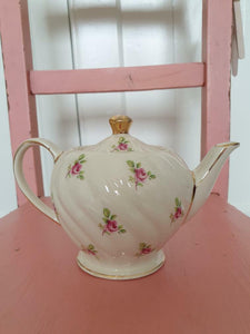 Beautiful one cup Sadler rosebud teapot sold with vintage CWS Windsor china rosebud sugar bowl.